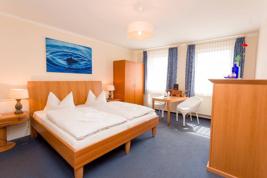 Hotel & Restaurant Am Bodden 푸트버스 객실 사진
